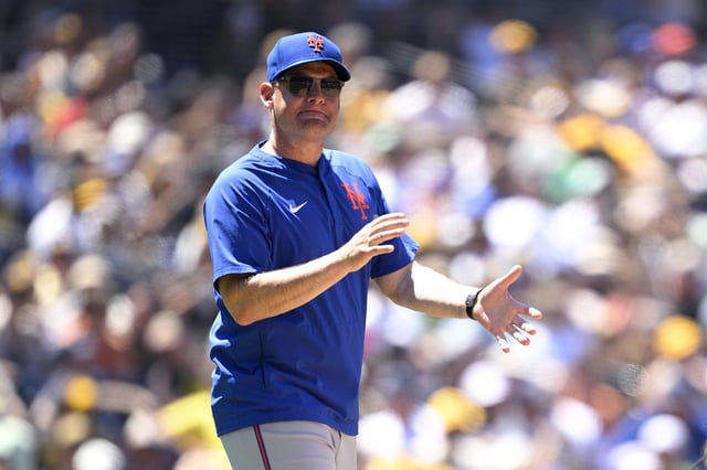 SAN DIEGO, CALIFORNIA - JULY 30: Manager Carlos Mendoza #64 of the New York Mets walks to the mound during the fourth inning against the San Diego Padres at Petco Park on July 30, 2025 in San Diego, California. (Photo by Orlando Ramirez/Getty Images)
