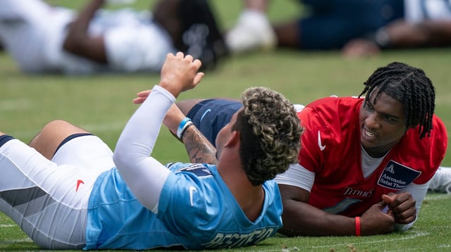 Syndication: The Tennessean Tennessee Titans Xavier Restrepo, left, and Cam Ward stretch during OTAs at Ascension Saint Thomas Sports Park in Nashville, Tenn., Wednesday, May 28, 2025. The two were former teammates at the University of Miami. © Denny Simmons / The Tennessean / USA TODAY NETWORK via Imagn Images