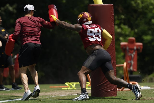 Jun 10, 2025; Ashburn, VA, USA; Washington Commanders defensive end Clelin Ferrell (99) participates in a drill on day one of minicamp at Commanders Park. Mandatory Credit: Geoff Burke-Imagn Images/File Photo