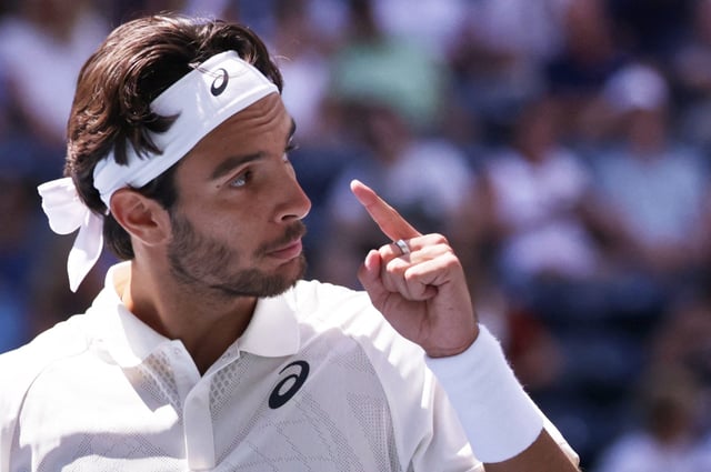 Tennis - U.S. Open - Flushing Meadows, New York, United States - August 26, 2025 Italy's Lorenzo Musetti reacts during his first round match against France's Giovanni Mpetshi Perricard REUTERS/Jeenah Moon
