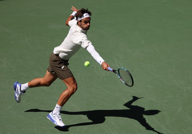 Tennis - U.S. Open - Flushing Meadows, New York, United States - August 26, 2025 Italy's Lorenzo Musetti in action during his first round match against France's Giovanni Mpetshi Perricard REUTERS/Shannon Stapleton