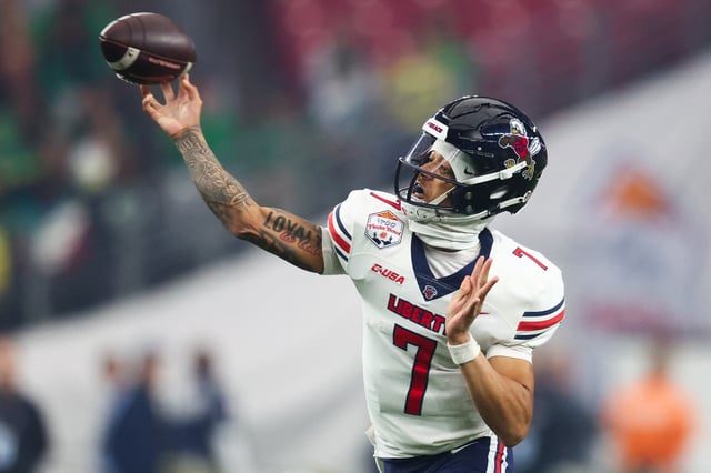 Jan 1, 2024; Glendale, AZ, USA;Liberty Flames quarterback Kaidon Salter (7) throws against the Oregon Ducks during the first quarter of the 2024 Fiesta Bowl at State Farm Stadium. Mandatory Credit: Mark J. Rebilas-USA TODAY Sports/File Photo
