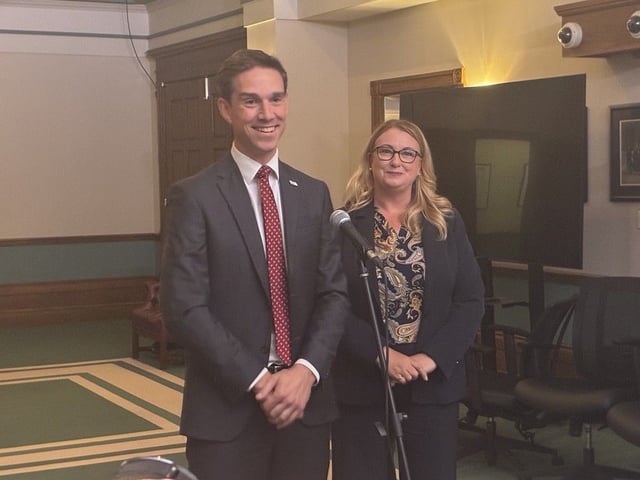  Premier John Hogan and NL Hydro President and CEO, Jennifer Williams, speak to reporters during a scrum on August 26, 2025.