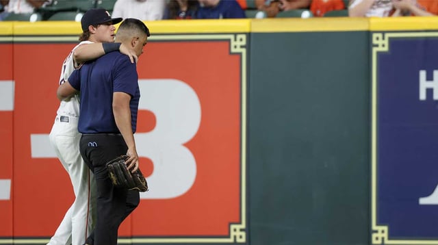 Jul 9, 2025; Houston, Texas, USA; Houston Astros center fielder Jake Meyers (6) is helped off the field by a trainer before the game against the Cleveland Guardians at Daikin Park. Mandatory Credit: Thomas Shea-Imagn Images