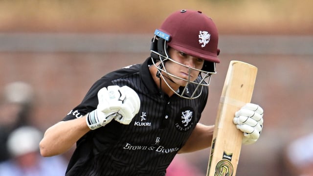 Vaughan punches the air as he brings up his maiden hundred … but he has a long way to go to catch his dad, the former England captain having hit 45 centuries in his career