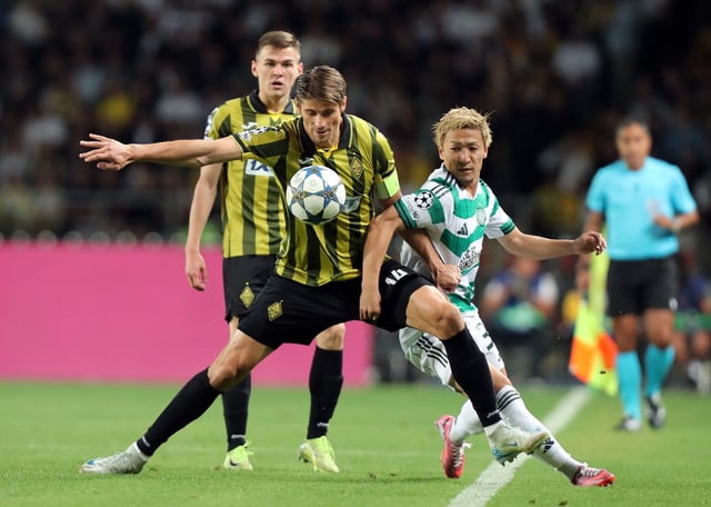 Soccer Football - UEFA Champions League - Play Off - Second Leg - Kairat v Celtic - Ortalyk Stadion, Almaty, Kazakhstan - August 26, 2025 Kairat's Alyaksandr Martynovich in action with Celtic's Daizen Maeda REUTERS/Pavel Mikheyev