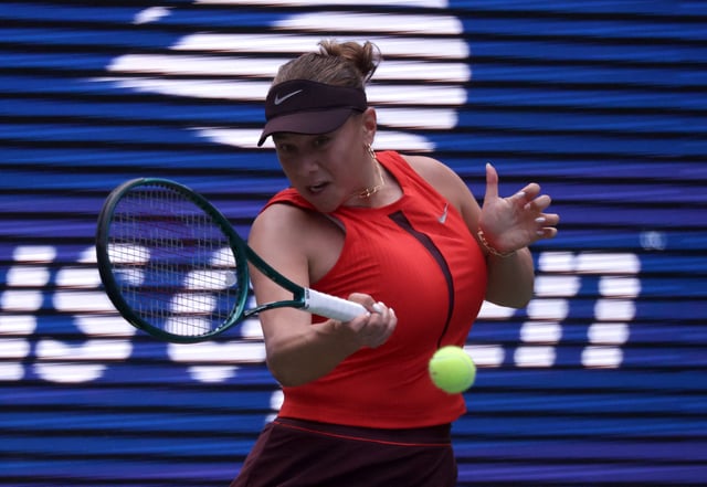 Tennis - U.S. Open - Flushing Meadows, New York, United States - August 26, 2025 Amanda Anisimova of the U.S. in action during her first round match against Australia's Kimberly Birrell REUTERS/Jeenah Moon