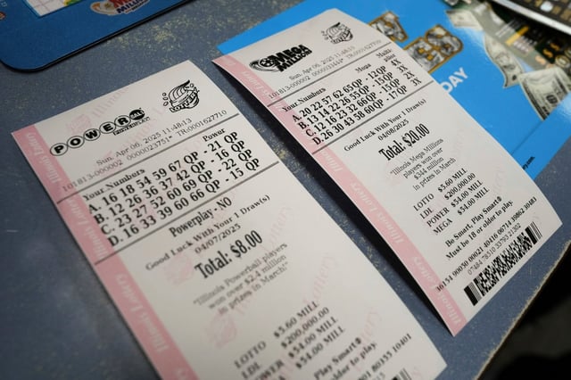 Purchased Powerball and Mega Millions tickets are shown at Mares Mart in Chicago on Sunday, April 6, 2025. (AP Photo/Nam Y. Huh)