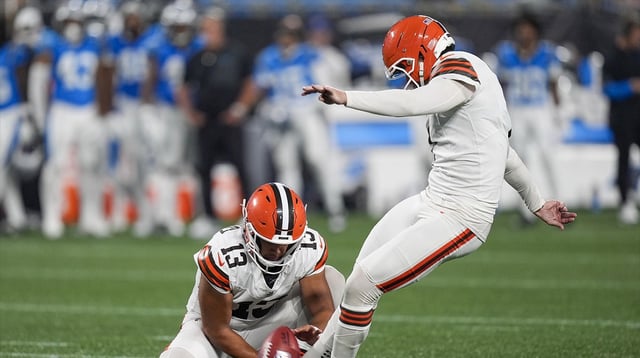Aug 8, 2025; Charlotte, North Carolina, USA; Cleveland Browns place kicker Dustin Hopkins (7) adds an extra point against the Carolina Panthers during the second half at Bank of America Stadium.