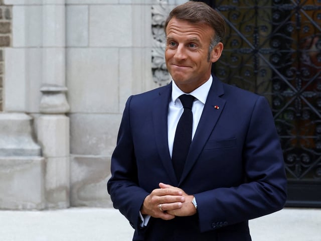 French President Emmanuel Macron speaks with the media after a meeting with U.S. President Donald Trump, Ukrainian President Volodymyr Zelenskiy and European leaders, amid negotiations to end the Russian war in Ukraine, at French Ambassador's residence in Washington, D.C., U.S., August 18, 2025. REUTERS/Yves Herman/Pool