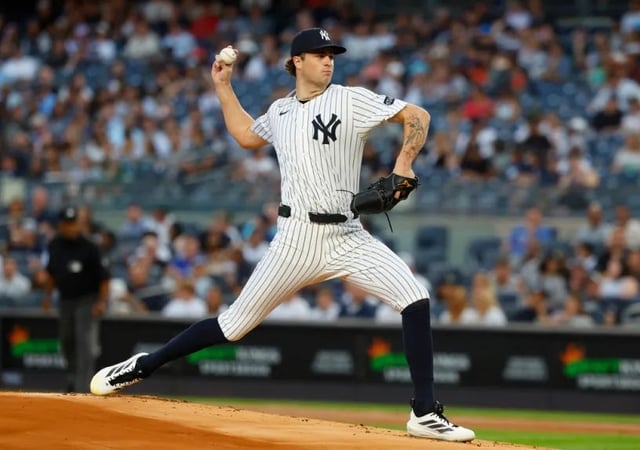 New York Yankees' Cam Schlittler throws against the Washington Nationals during the first inning of a baseball game, Monday, Aug. 25, 2025, in New York. (AP Photo/Noah K. Murray)