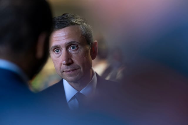 Ken Martin, chairman of the Democratic National Committee, speaks to the reporters following a press conference with Texas Democrats on August 5, 2025 in Aurora, Illinois.