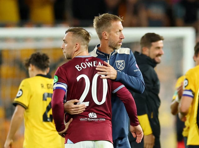 Soccer Football - Carabao Cup - Second Round - Wolverhampton Wanderers v West Ham United - Molineux Stadium, Wolverhampton, Britain - August 26, 2025 West Ham United manager Graham Potter and West Ham United's Jarrod Bowen look dejected after the match Action Images via Reuters/Andrew Boyers