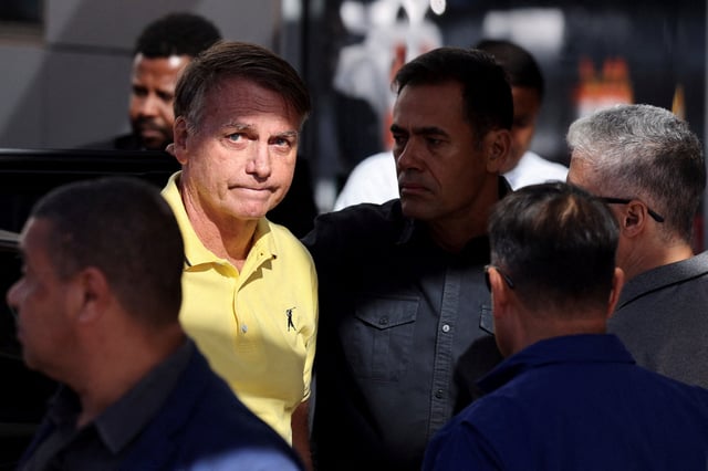Brazil's former President Jair Bolsonaro arrives at a hospital for medical examinations, authorized by Supreme Court Justice Alexandre de Moraes, leaving the house arrest as he awaits trial after being accused of plotting a coup following his electoral defeat, in Brasilia, Brazil, August 16, 2025. REUTERS/Adriano Machado/File photo