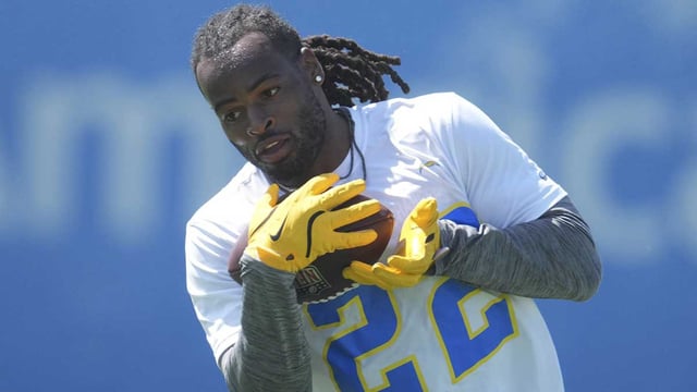 May 20, 2025; El Segundo, CA, USA; Los Angeles Chargers running back Najee Harris (22) catches the ball during offseason workouts at The Bolt. Mandatory Credit: Kirby Lee-Imagn Images