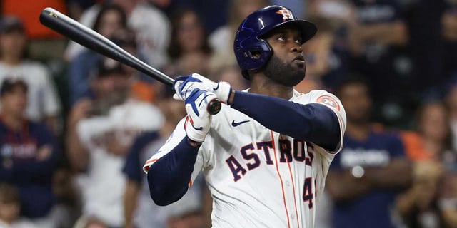Apr 20, 2025; Houston, Texas, USA; Houston Astros left fielder Yordan Alvarez (44) hits a RBI sacrifice against the San Diego Padres in the fifth inning at Daikin Park. Mandatory Credit: Thomas Shea-Imagn Images