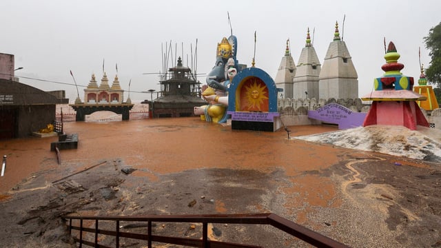 Har ki Pauri Temple partially submerged following heavy rainfall, in Jammu on August 26