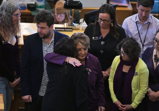 Colorado House Majority Leader Monica Duran, center, hugs state Rep. Yara Zokaie after she spoke in the House chambers on a resolution condemning the conduct of former Rep. Ryan Amagost, during the special legislative session at the Colorado State Capitol in Denver, on Aug. 26, 2025. (Photo by RJ Sangosti/The Denver Post)