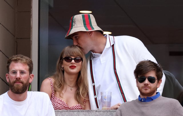 Tennis - U.S. Open - Flushing Meadows, New York, United States - September 8, 2024 Singer Taylor Swift and Kansas City Chiefs' Travis Kelce are seen ahead of the final match between Italy's Jannik Sinner and Taylor Fritz of the U.S. REUTERS/Mike Segar/File Photo