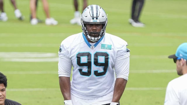 Jun 4, 2024; Charlotte, NC, USA; Carolina Panthers defensive tackle Shy Tuttle (99) prepares for a drill during OTAs. Mandatory Credit: Jim Dedmon-Imagn Images
