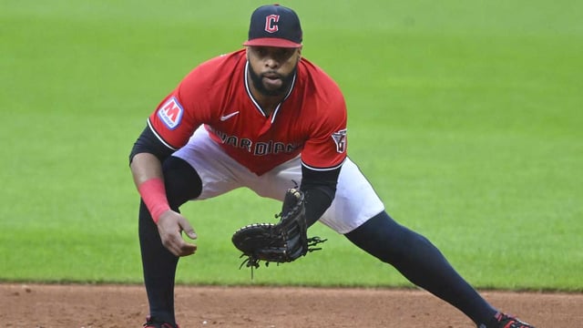 Aug 25, 2025; Cleveland, Ohio, USA; Cleveland Guardians first baseman Carlos Santana (41) fields a ground ball in the third inning against the Tampa Bay Rays at Progressive Field. Mandatory Credit: David Richard-Imagn Images