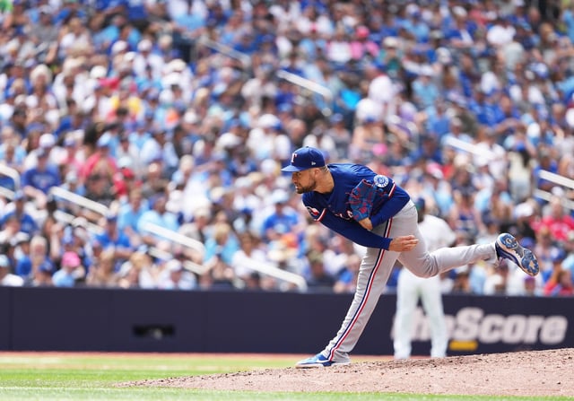Aug 17, 2025; Toronto, Ontario, CAN; Texas Rangers starting pitcher Nathan Eovaldi (17) throws a pitch against the Toronto Blue Jays during the fifth inning at Rogers Centre. Mandatory Credit: Nick Turchiaro-Imagn Images/File Photo