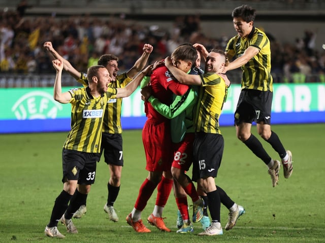 Kairat players celebrate after winning the Champions League playoff second leg soccer match between Kairat and Celtic at Ortalyk stadium in Almaty, Kazakhstan, Wednesday, Aug. 27, 2025. (AP Photo/Alikhan Sariyev)