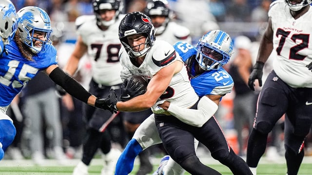 Detroit Lions cornerback Rock Ya-Sin (23) tackles Houston Texans tight end Harrison Bryant (88) during the first half at Ford Field in Detroit on Saturday, August 23, 2025.