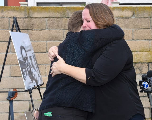 Angie Reed, mother of Armand Del Campo, hugs Kathy Stickel, Aunt of Julie Hamori, who who were among the four victims killed in a July 20 crash on the 605 Freeway in Norwalk, after a press conference in front of the CHP office in Santa Fe Spring to announce the filing of a government claim against the California Highway Patrol and the state on Tuesday Aug. 26, 2025. (Photo by Keith Durflinger, Contributing Photographer)