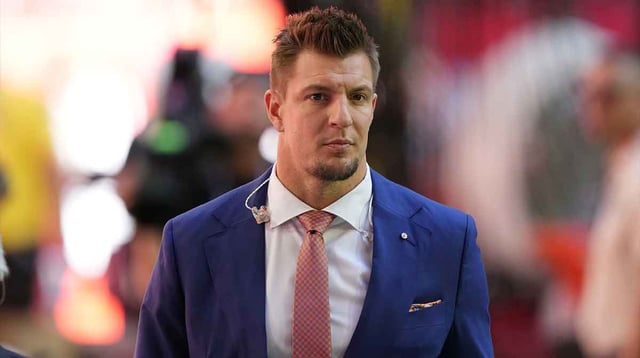 Feb 12, 2023; Glendale, Arizona, US; Former NFL player Rob Gronkowski looks on before Super Bowl LVII between the Kansas City Chiefs and the Philadelphia Eagles at State Farm Stadium. Mandatory Credit: Joe Camporeale-Imagn Images