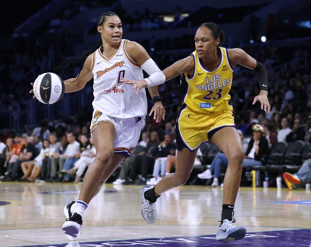 Satou Sabally #0 of the Phoenix Mercury drives to the basket on Azura Stevens #23 of the Los Angeles Sparks during an 85-80 Mercury win at Crypto.com Arena on June 01, 2025 in Los Angeles, California.