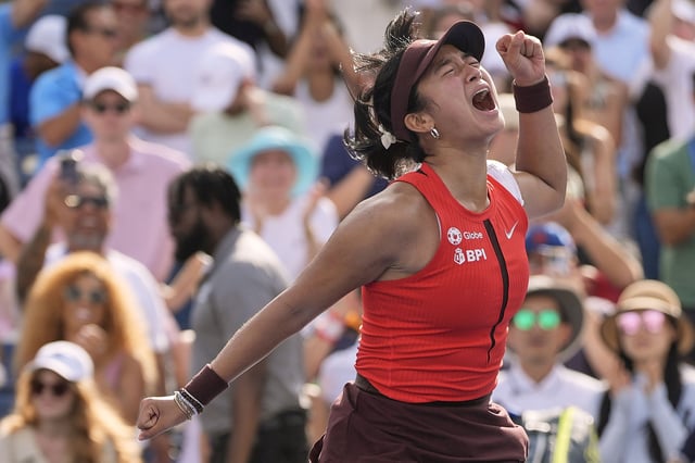 Alexandra Eala, of the Philippines, reacts after defeating Clara Tauson, of Denmark, during the first round of the US Open tennis championships, Sunday, Aug. 24, 2025, in New York. (AP Photo/Seth Wenig)