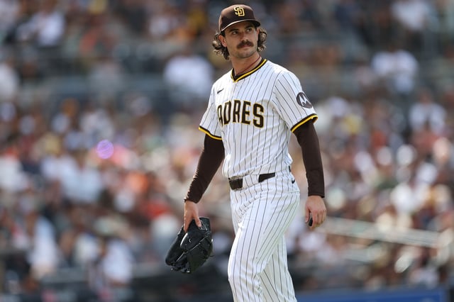 SAN DIEGO, CALIFORNIA - AUGUST 21: Dylan Cease #84 of the San Diego Padres walks to the dugout after being taken out of the game during the sixth inning of a game against the San Francisco Giants at Petco Park on August 21, 2025 in San Diego, California.