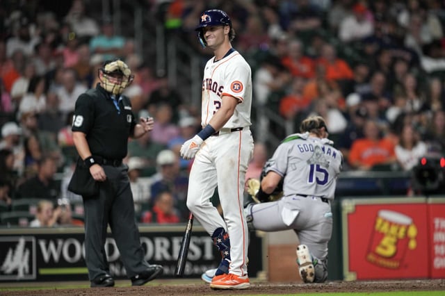 Houston Astros Jacob Melton (31) reacts after being called out on strike to end the fourth inning of an MLB baseball game in Houston, Tuesday, Aug. 26, 2025.