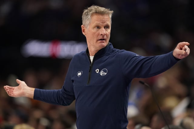 Golden State Warriors head coach Steve Kerr reacts during the first half against the Dallas Mavericks at American Airlines Center on April 05, 2024 in Dallas, Texas.
