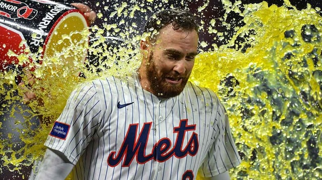 Aug 26, 2025; New York City, New York, USA; New York Mets outfielder Brandon Nimmo (9) is doused by teammates after hitting a walk off single against the Philadelphia Phillies during the ninth inning at Citi Field. Mandatory Credit: John Jones-Imagn Images