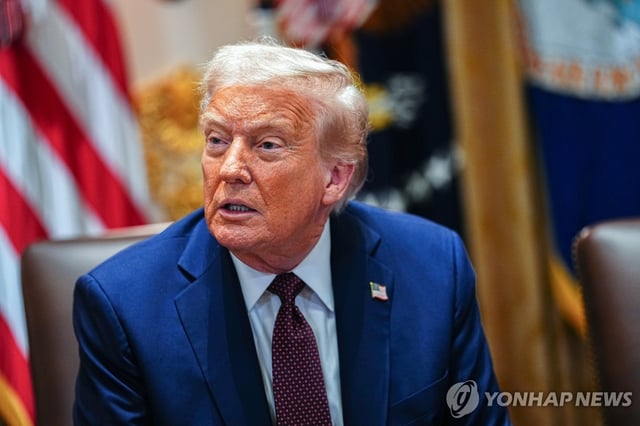 This UPI photo shows U.S. President Donald Trump answering reporters' questions during a Cabinet meeting in the Cabinet Room of the White House in Washington on Aug. 26, 2025. (Yonhap) 