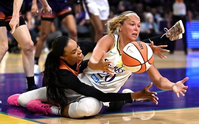 Sparks guard Julie Allemand, right, and Phoenix Mercury forward DeWanna Bonner scramble for a loose ball during the first half on Tuesday night at Crypto.com Arena. (Photo by Keith Birmingham, Pasadena Star-News/SCNG)