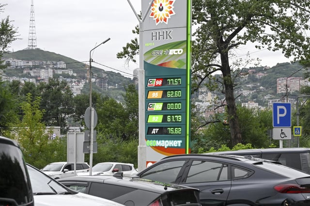Cars are parked at a gas station in Vladivostok, Russia, on Aug. 25, 2025. (AP Photo)