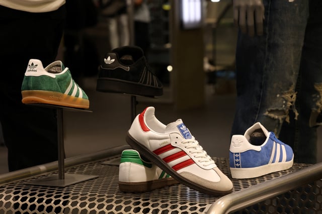 Adidas sneakers are seen on display at the newly renovated JD Sports store at Westfield Stratford City in London, Britain, July 30. REUTERS/Mina Kim/ File Photo