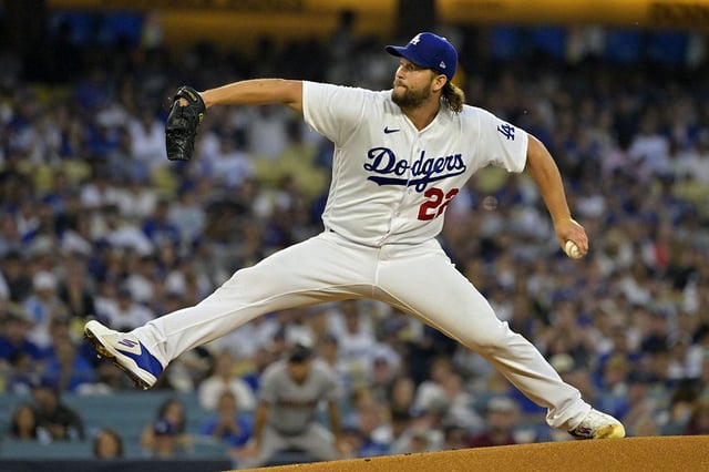 Oct 7, 2023; Los Angeles, California, USA; Los Angeles Dodgers starting pitcher Clayton Kershaw (22) throws a pitch in the first inning for game one of the NLDS for the 2023 MLB playoffs at Dodger Stadium. Mandatory Credit: Jayne Kamin-Oncea-USA TODAY Sports
