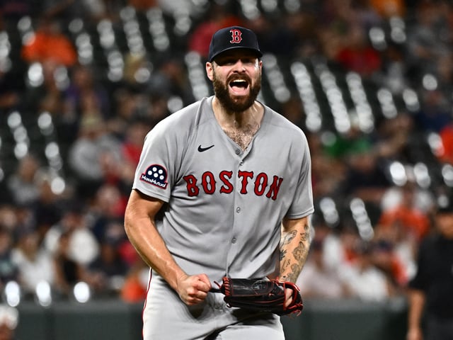 Aug 26, 2025; Baltimore, Maryland, USA; Boston Red Sox pitcher Lucas Giolito (54) reacts to a strikeout to end the eighth inning against the Baltimore Orioles at Oriole Park at Camden Yards. Mandatory Credit: James A. Pittman-Imagn Images