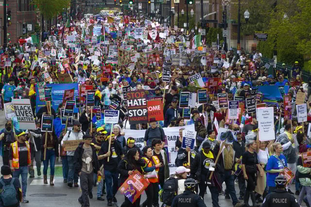 An aerial view shows demonstrators marching toward downtown protesting the policies of President Donald Trump and showing their support for union labor on May 1, 2025 in Chicago, Illinois.
