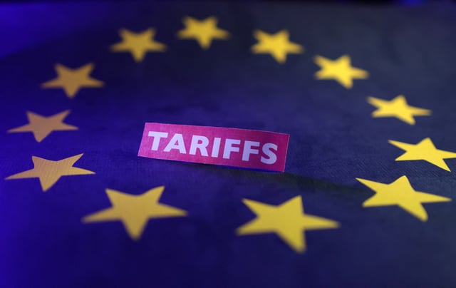 A European Union flag and a "tariffs" label are seen in this illustration taken April 10, 2025. REUTERS/Dado Ruvic/Illustration