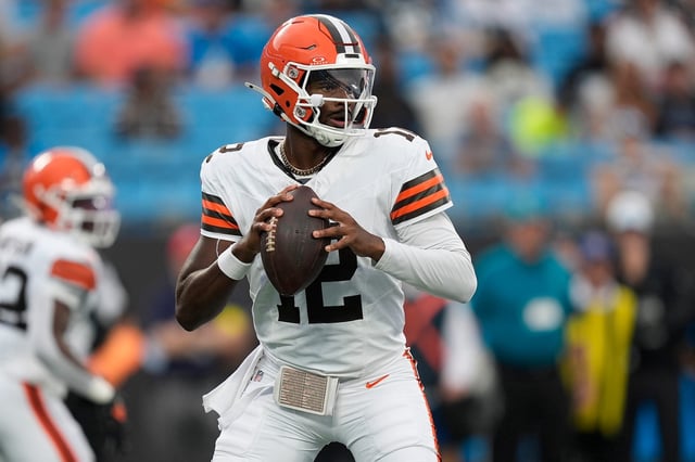 Cleveland Browns quarterback Shedeur Sanders (12) drops back to pass against the Carolina Panthers during the first quarter at Bank of America Stadium in Charlotte on Aug. 8, 2025.