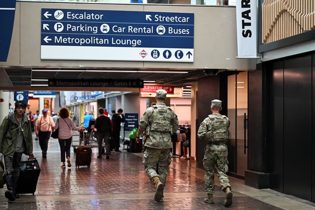 U.S. National Guard members patrol inside Union Station, after U.S. President Donald Trump deployed National Guard and ordered an increased presence of federal law enforcement to assist in crime prevention, in Washington, DC, U.S., August 21, 2025. REUTERS/Annabelle Gordon/File Photo