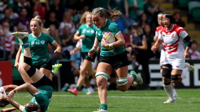 Fiona Tuite of Ireland runs with the ball before scoring her team's fourth try during the Women's Rugby World Cup 2025
