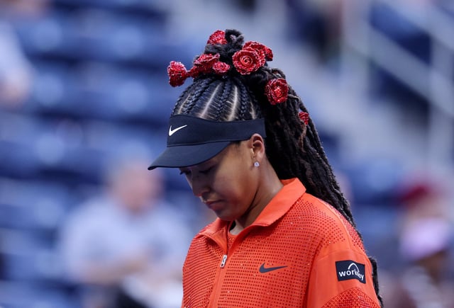 Naomi Osaka wore a rose-themed outfit for her first round match against Belgium's Greet Minnen at the US Open.