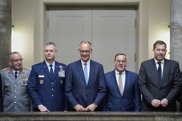 From left to right, German Federal Armed Forces (Bundeswehr) Chief of Defence Carsten Breuer, NATO SACEUR General Alexus Grynkewich, German Chancellor Friedrich Merz, German Defense Minister Boris Pistorius, and Finance Minister Lars Klingbeil pose for a group picture prior to the Cabinet meeting at the Defense Ministry in Berlin, Germany, Wednesday, Aug. 27, 2025. (AP Photo/Ebrahim Noroozi)