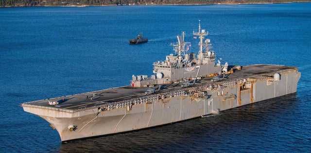 The USS Iwo Jima, a Wasp-class amphibious assault ship of the United States Navy takes part in the NATO exercise Trident Juncture 2018 near Trondheim, Norway, on October 29, 2018. - Trident Juncture 2018, is a NATO-led military exercise held in Norway from 25 October to 7 November 2018. The exercise is the largest of its kind in Norway since the 1980s. Around 50,000 participants from NATO and partner countries, some 250 aircraft, 65 ships and up to 10,000 vehicles take part in the exercise. The main goal of Trident Juncture is allegedly to train the NATO Response Force and to test the alliance's defence capability. (Photo by Jonathan NACKSTRAND / AFP)